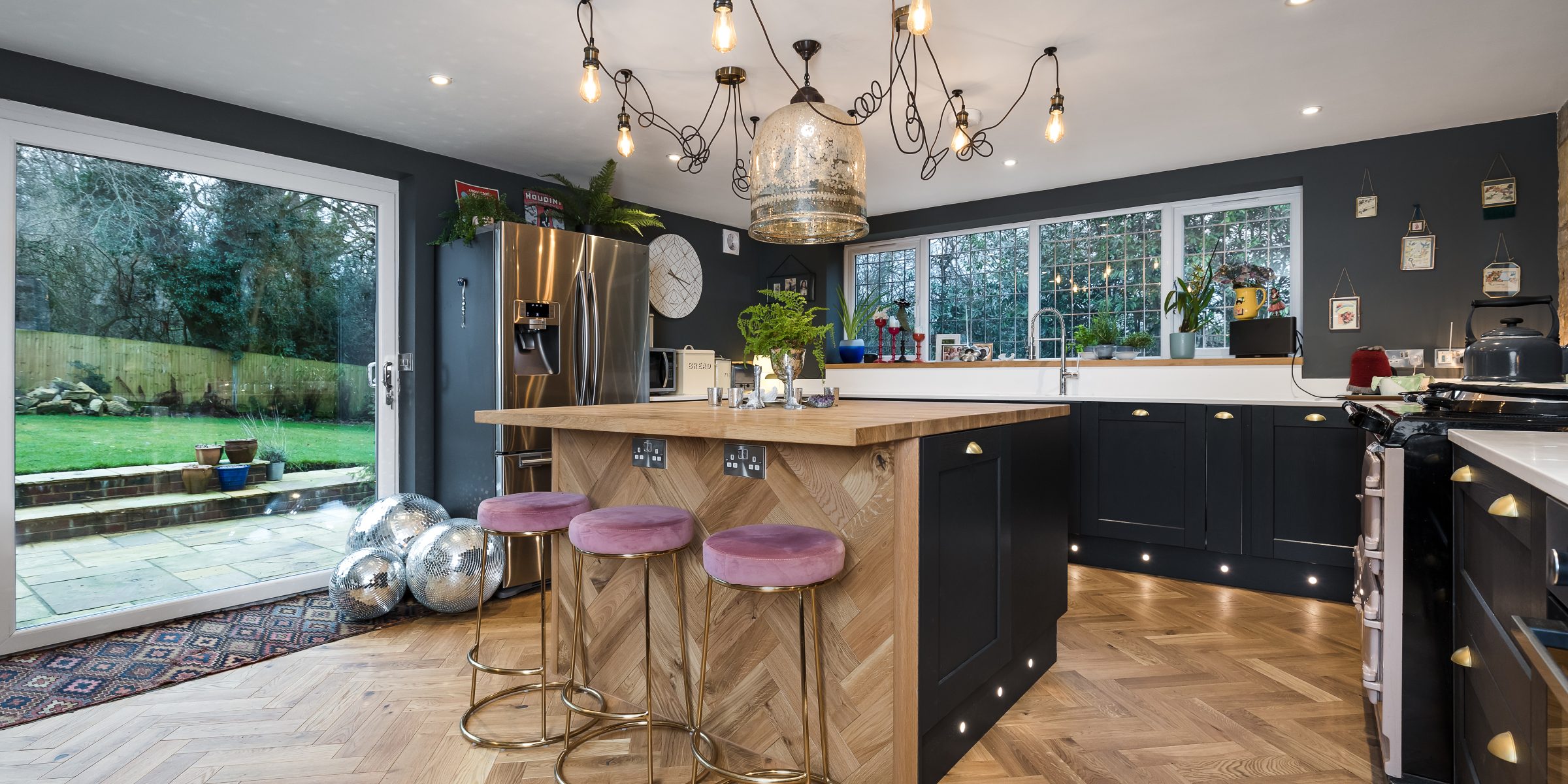 herringbone wood floors in cottage kitchen