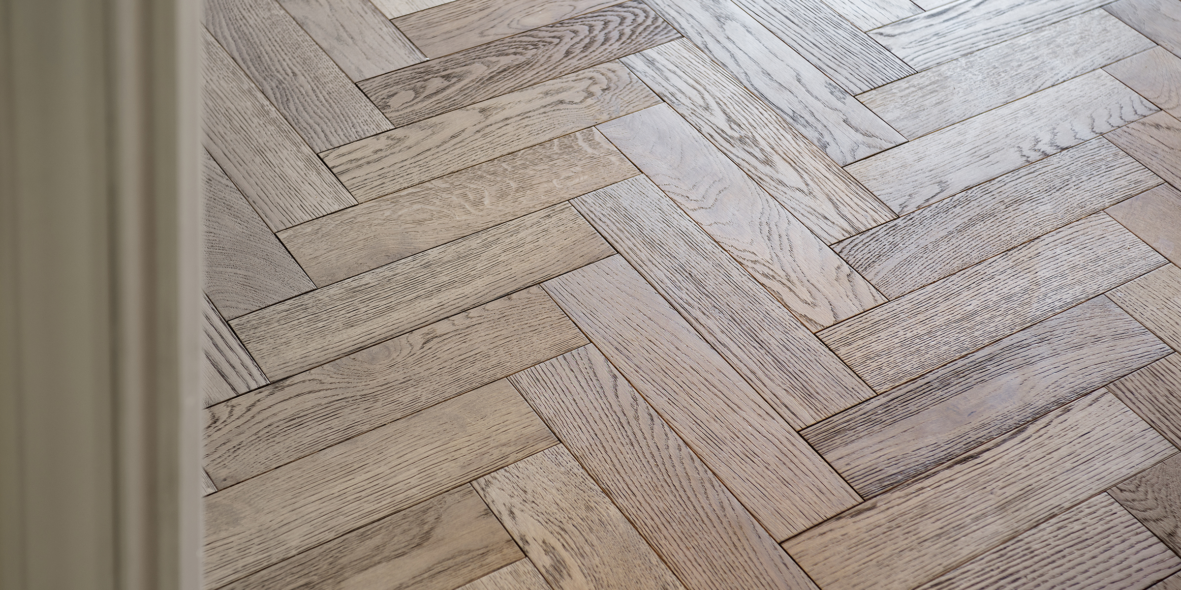 mid tone herringbone wood floors