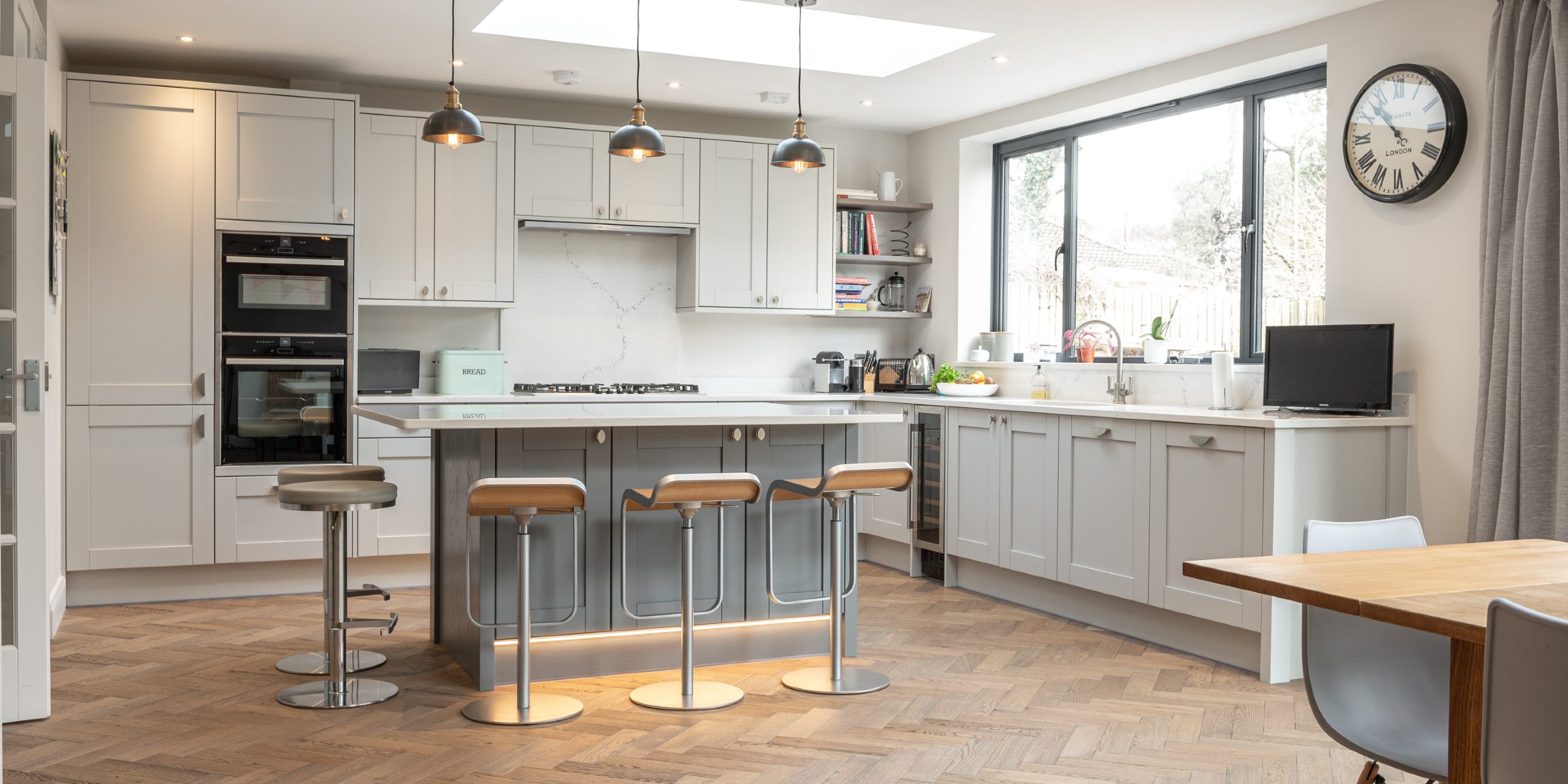howdens kitchen with herringbone flooring